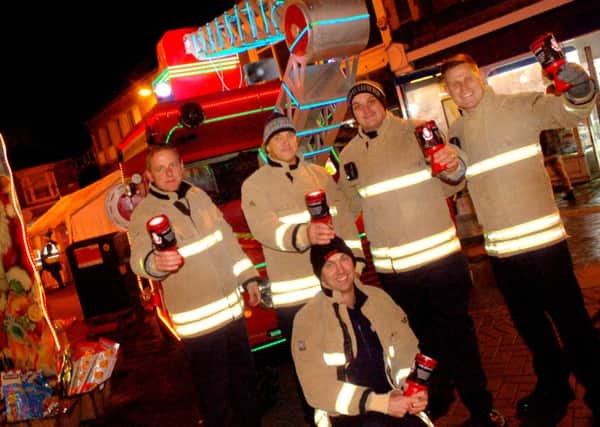 Melton's firefighters and Trumpton in the Market Place PHOTO: Tim Williams