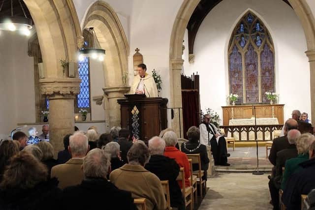 The Bishop of Leicester, the Rt Rev Martyn Snow leads the rededication service in St James' Church, Burton Lazars PHOTO: Supplied