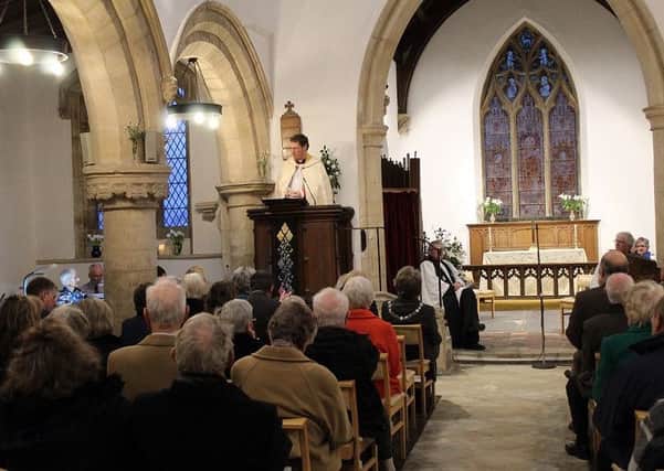 The Bishop of Leicester, the Rt Rev Martyn Snow leads the rededication service in St James' Church, Burton Lazars PHOTO: Supplied