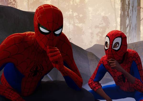(Left to right): Peter Parker (voiced by Jake Johnson) and Miles Morales (voiced by Shameik Moore) PHOTO: PA Photo/CTMG, Inc./Sony Pictures Animation