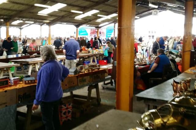 Stallholders in the covered market at Melton Cattle Market EMN-170706-161452001