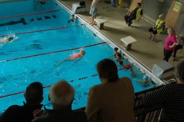 Spectators get an aerial view from the balcony PHOTO: Tim Williams
