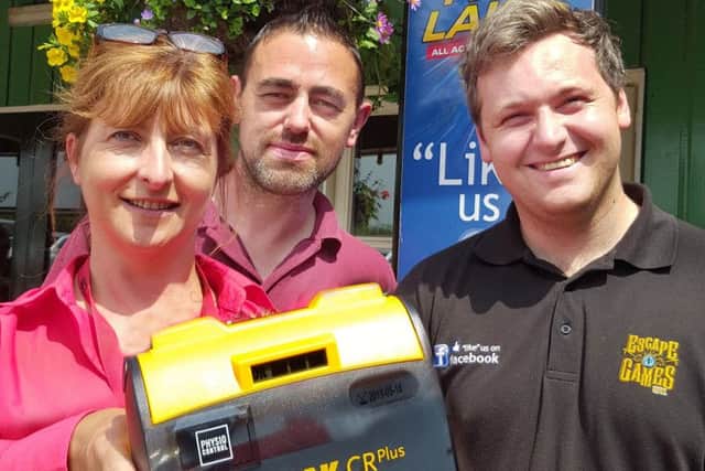 Staff at Twinlakes with their new difibrillator EMN-190118-143700001