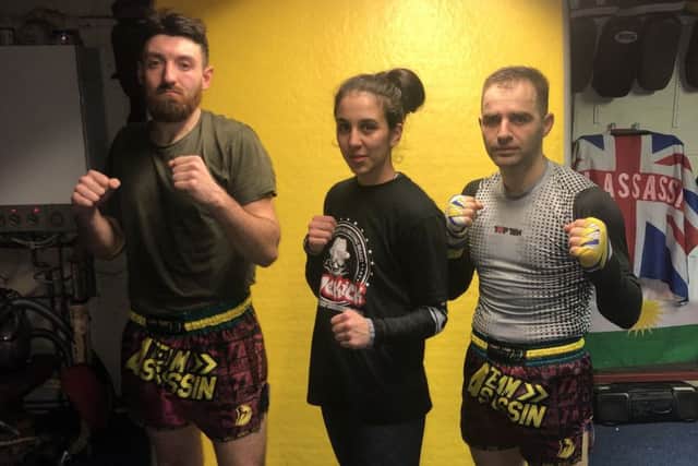 Multiple world champion Iman Barlow flanked by Assassin debutants Aleksander Vorfi and Michael Fellows EMN-190122-175604002