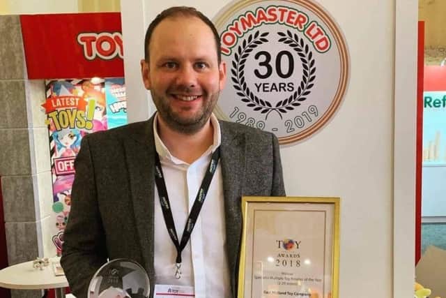 Melton Toymaster owner James Colclough with the award for being named best independent toy retailer at the National Toy Awards EMN-190123-142625001
