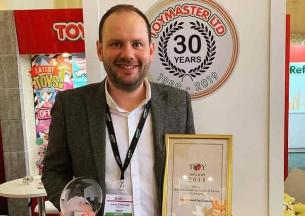 Melton Toymaster owner James Colclough with the award for being named best independent toy retailer at the National Toy Awards EMN-190123-142625001