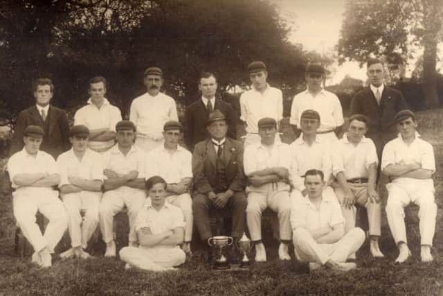 Kettleby and Wartnaby cricket team of 1929 with Vale of Belvoir League Trophy and Melton Hospital Cup. It was the fifth-year running the team had been Belvoir League champions EMN-190129-184510002