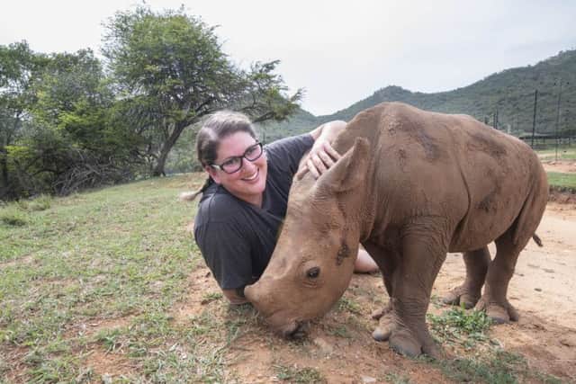 Jennifer Yarwood, 33, with Arthur the rhino, pictured during the Veterans for Wildlife project at the Care for Wild Rhino Sanctuary near the Kruger National Park in South Africa EMN-190131-133828001