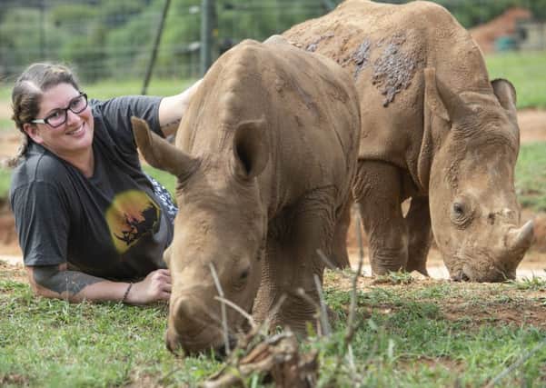 Jennifer Yarwood, 33, with Arthur the rhino, pictured during the Veterans for Wildlife project at the Care for Wild Rhino Sanctuary near the Kruger National Park in South Africa EMN-190131-133909001
