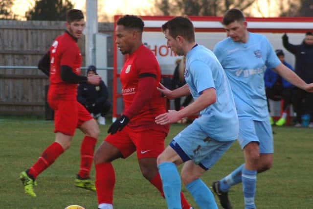Town co-manager Jon Stevenson scored one and created another against Bourne EMN-190402-084120002