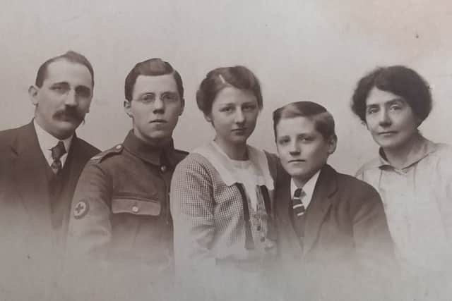 Leonard Folwell (second from left), who served in the Great War, pictured with family members EMN-190802-135336001