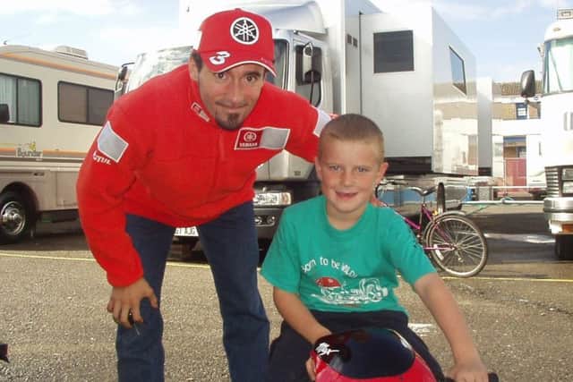 A young Max Stainton with his namesake and two-time world superbike champion Max Biaggi EMN-190802-154416002