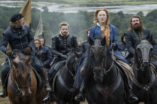 Ian Hart as Lord Maitland, Jack Lowden as Lord Darnley, Saoirse Ronan as Mary Stuart and James McArdle as Earl of Moray PHOTO: PA Photo/Focus Features LLC/Liam Daniel