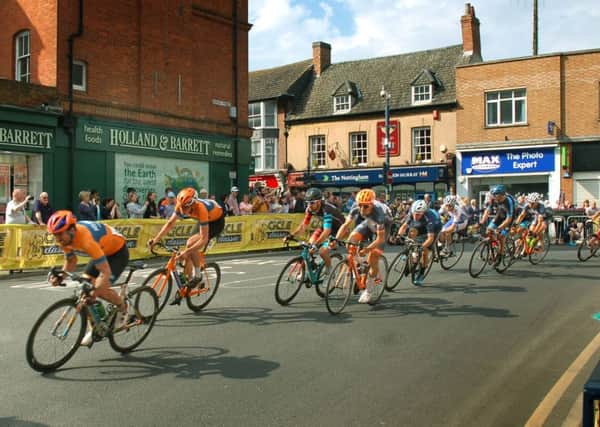 Riders sweep through Melton as they begin the finishing circuit EMN-190214-151334002
