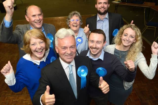 Sir Alan Duncan (front) celebrates his victory with fellow Conservatives at the General Election results night for the 2017 Rutland and Melton seat.656464-16 : ?Lionel Heap EMN-190220-101942001