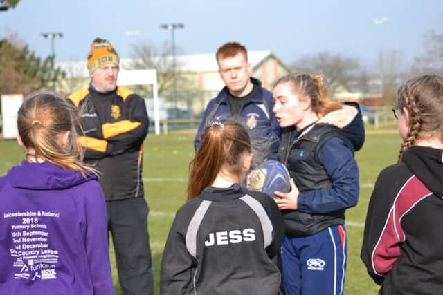 England Touch Rugby star Kate Davis-Bavin gives Melton RFC's new girls' squad some top-level tips EMN-190219-132906002