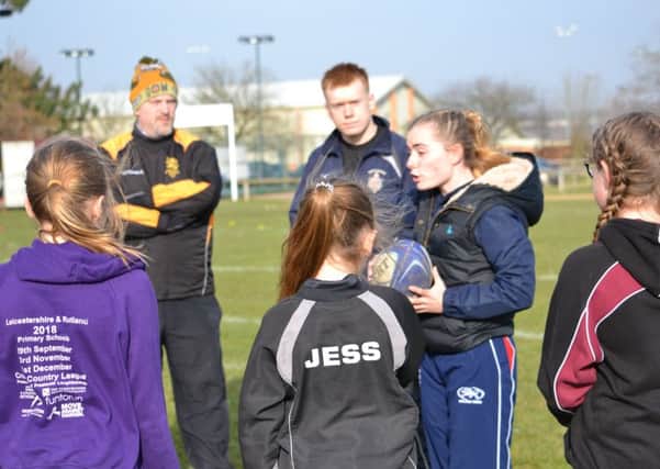 England Touch Rugby star Kate Davis-Bavin gives Melton RFC's new girls' squad some top-level tips EMN-190219-132906002