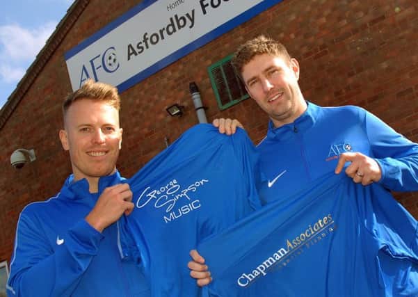 Player-sponsor George Simpson with Asfordby FC player-manager Lee Mann EMN-190226-185005002
