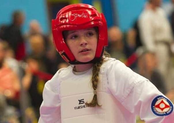 Charlotte will fight internationally for England just three years after taking up the martial art EMN-190226-182648002