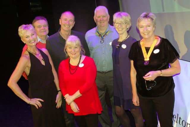 Jonathan and Emma Agnew pictured with members of Melton Aurora Rotary Club before Friday's fundraising show at Melton Theatre EMN-190227-103404001