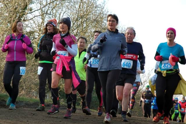 The field at the 2018 Belvoir Challenge makes its way towards Stathern EMN-190228-095743001