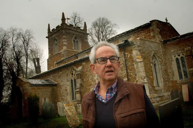Churchwarden Neil Rogers outside St Denys Church. Goadby Marwood, which had its roof lead stripped by thieves EMN-190103-094141001