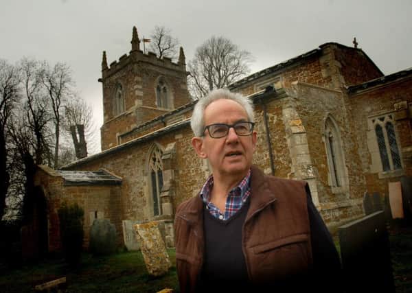 Churchwarden Neil Rogers outside St Denys Church. Goadby Marwood, which had its roof lead stripped by thieves EMN-190103-094141001