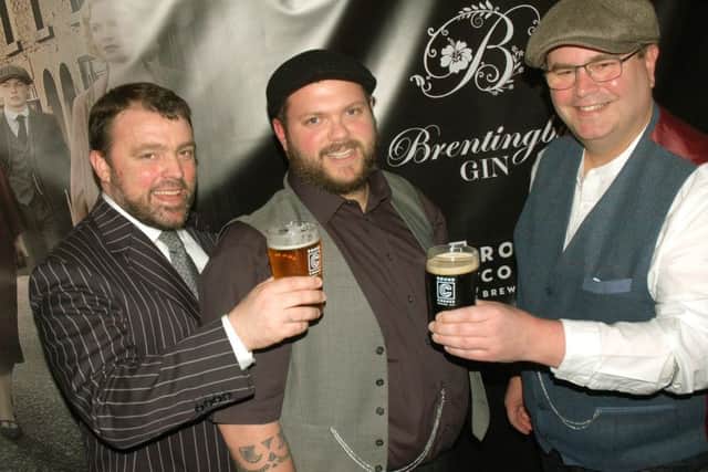 Round Corner brewery's Combie Cryan and Colin Paige with Brentingby Gin distiller Bruce Midgley (centre) PHOTO: Tim Williams