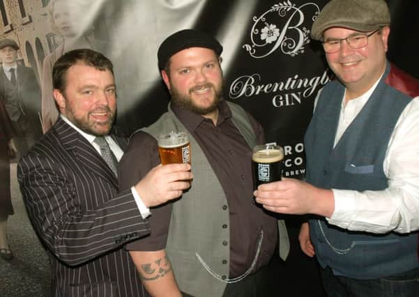 Round Corner brewery's Combie Cryan and Colin Paige with Brentingby Gin distiller Bruce Midgley (centre) PHOTO: Tim Williams