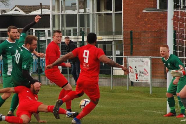 Laithan Hammond hooks in Town's second goal against Blackstones EMN-190503-131535002