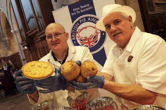 Phil Walmsley, from Nice Pie, and Paul Hartland, of Mrs King's Pork Pies, prepare to start judging in the 2019 British Pie Awards in Melton EMN-190603-115543001