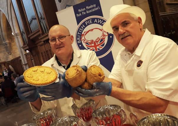 Phil Walmsley, from Nice Pie, and Paul Hartland, of  Mrs King's Pork Pies, prepare to start judging in the 2019 British Pie Awards in Melton EMN-190603-115543001