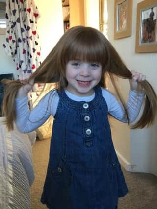 Olivia Fryer (3), who is helping the Little Princess Trust and Young Epilepsy charities by having her long hair cut EMN-190703-115524001