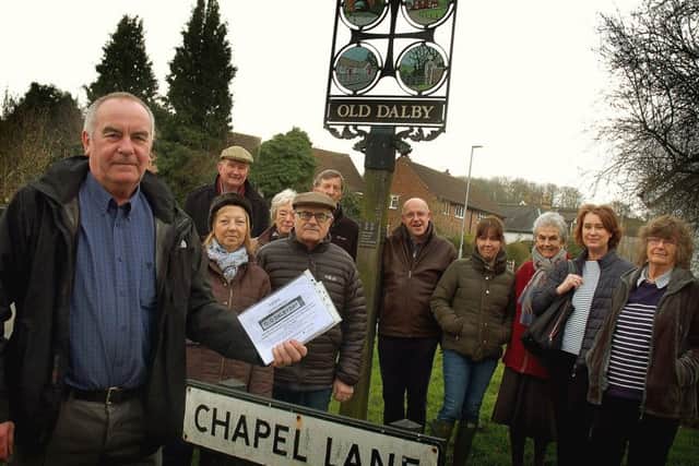 Russ Hamer and some of the other Old Dalby Day organisers pictured last year during a successful appeal for extra help from volunteers - the event has had to be suspended this year due to a lack of help EMN-190803-120648001