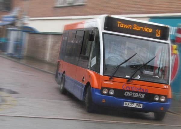 A Centrebus 14 service bus turns out of Windsor Street, Melton EMN-190803-130220001