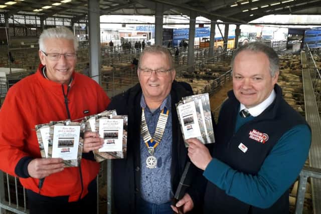 Hugh Brown (right), CEO of Melton Mowbray Market and founder of its operator Gillstream Markets, with local historian Derek Simmonds (left) and Jim Schofield, from Melton & Belvoir Rotary Club, holding the new 150th anniversary brochures EMN-191203-163357001