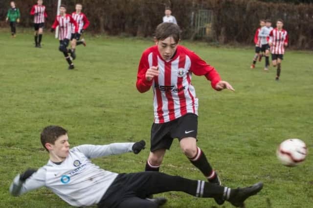 Action from a hard-fought quarter-final in Quorn EMN-190313-100212002