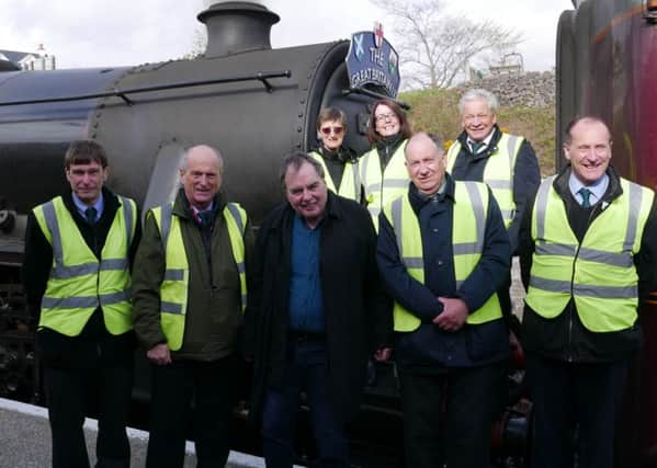The late Nigel Dobbing (centre) with colleagues from The Railway Touring Company EMN-190314-100852001