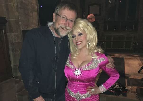 Brian Keevil, chairman of Hose Village Hall committee with Kelly O'Brien as Dolly Parton PHOTO: Supplied