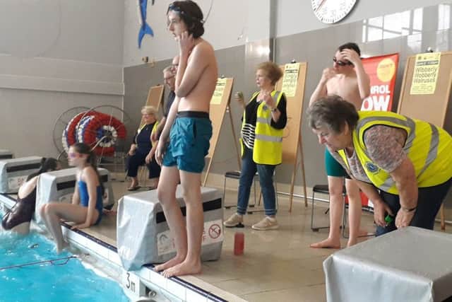 Lions and swimmers at the Swimarathon PHOTO: Tim Williams