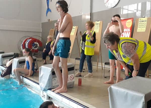 Lions and swimmers at the Swimarathon PHOTO: Tim Williams