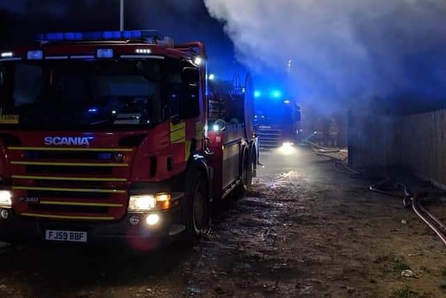Firefighters at the scene of a blaze on Sandy Lane, Melton, which destroyed six caravans EMN-190319-091645001