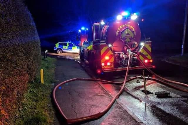 Firefighters at the scene of a blaze on Sandy Lane, Melton, which destroyed six caravans EMN-190319-091655001