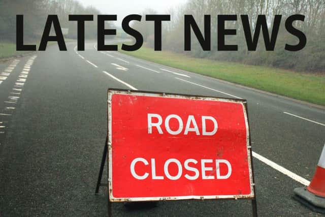 Police have closed the road EMN-190319-101946001