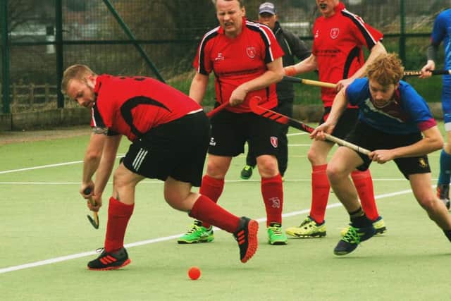 Matt Courtman in the thick of the action during Melton Second XI's 4-1 home defeat to Coventry EMN-190319-105037002