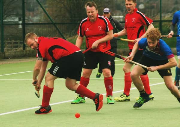 Matt Courtman in the thick of the action during Melton Second XI's 4-1 home defeat to Coventry EMN-190319-105037002