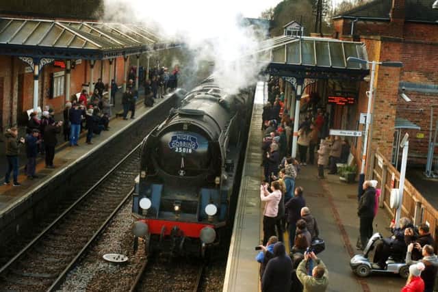 The Nigel Dobbing memorial steam train arrives at Melton station
PHOTO TIM WILLIAMS EMN-190319-153512001