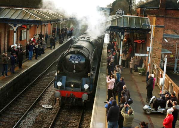 The Nigel Dobbing memorial steam train arrives at Melton station
PHOTO TIM WILLIAMS EMN-190319-153512001