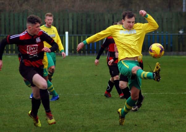 Connor O'Grady at full stretch against Raunds