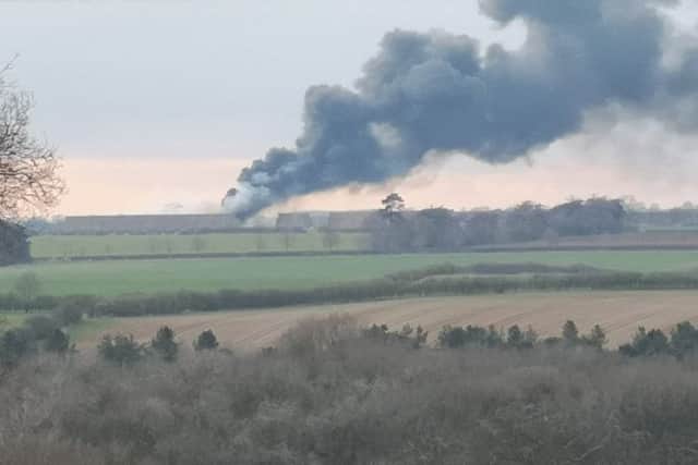 The huge stacks blaze at Saltby viewed from Buckminster EMN-190320-090949001